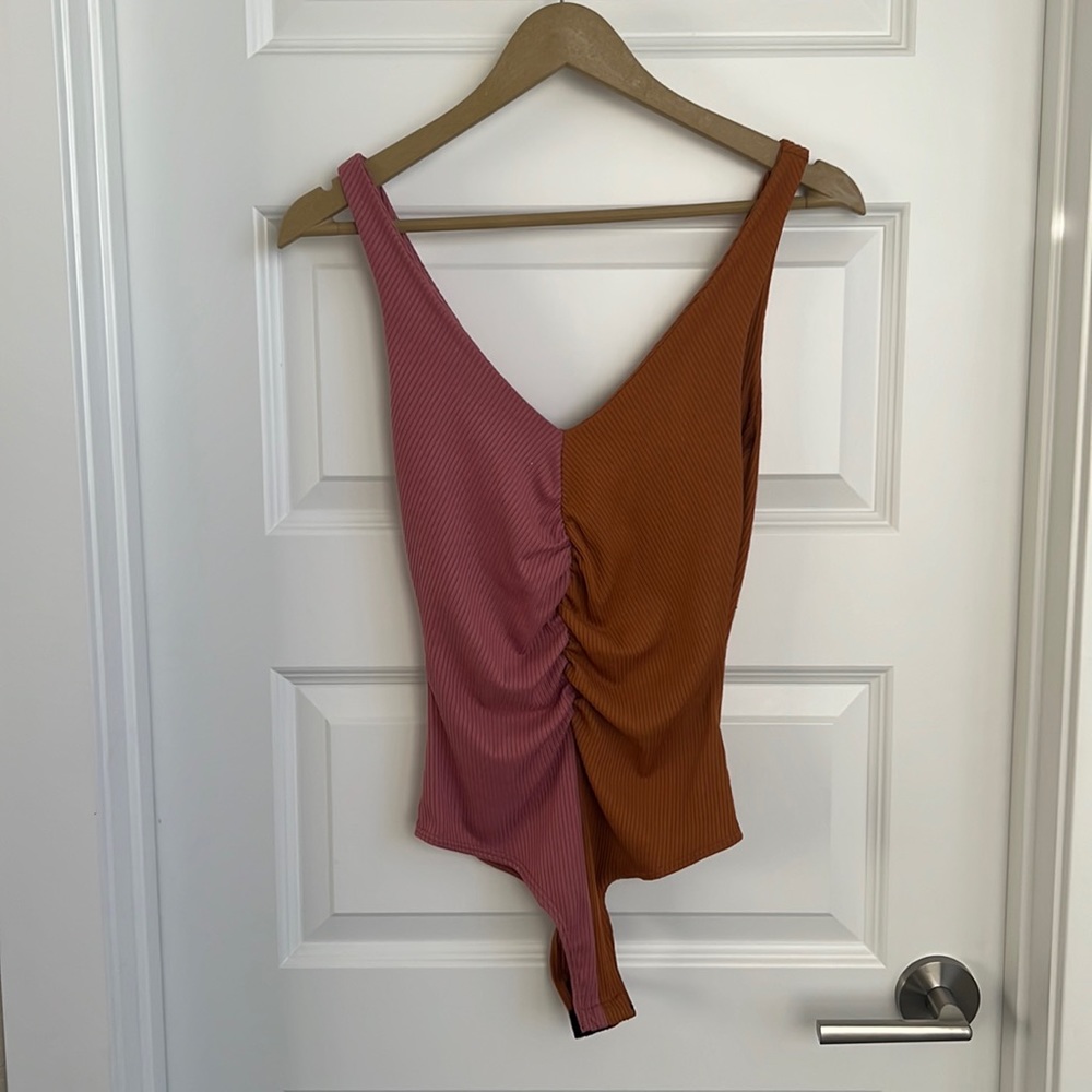 Small, pink and orange tank body suit